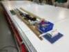 Quantity of Cutter Table Equipment to include 2 x Pairs Tailoring Scissors; Cloth Weights; 2000mm (L) Wooden and Steel Rulers; Roughneck Quick Clamps; Chain Mail Cutting Gloves; Knives and Blades - 5