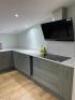 Fitted 12 Piece U-Shaped Kitchen Display in Green with White Marble Worktop with Grey Veining (3800mm x 2900mm x 3200mm), Integrated Pull Out Twin Bins, Double Corner Pull Out Shelving, Double Corner Rotating Pull Out Shelving & FRANKE 1½ Bowl Stainless S - 3