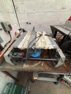 Remaining Loose and Removable decommissioned equipment to include DEWALT Chop Saw; 2 TREND Router Tables; 2 Table Saws; Mig Welder and Various Machine Parts - Note: Condition Unknown - 4