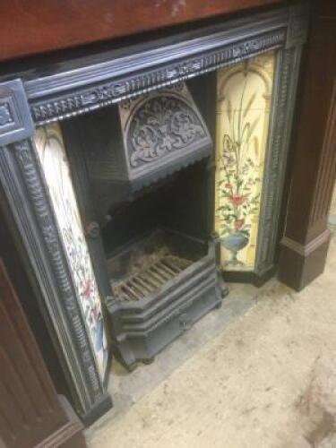 Cast Iron and Tiled Fire Place with Dark Stained Fire Surround