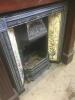 Cast Iron and Tiled Fire Place with Dark Stained Fire Surround