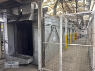 Powder coating line with overhead conveyor