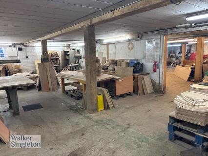 Entire Remaining Contents to Timber Workshop/Basement to include Large Waitt of Wood Off-Cuts, Chair Components, Metal Cabinets, Pallets & Other (See Images); Please Note: Buyer Responsible to Remove Entire Contents of Lot; A Bond May Be Applicable and Re