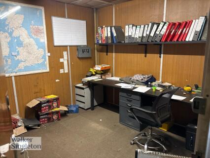 Contents to Warehouse Office to include Office Desk & Chair & IT Equipment