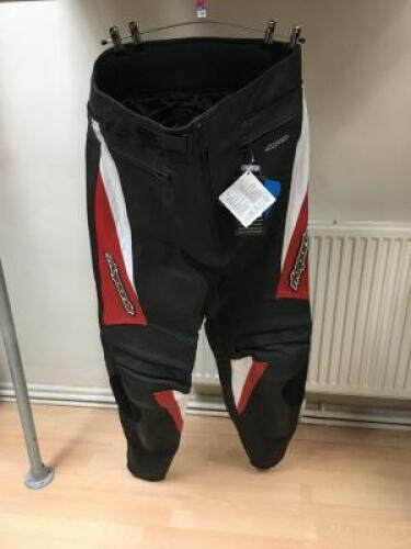 RK SPORTS Chief TRS Trousers Model: N/A Colour: Red / Black Size: 44 Approximate Retail Price (GBP):95 URN: WS10308