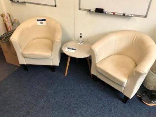 2 Low Level Pale Leather Bucket Chairs with Small Circular Table